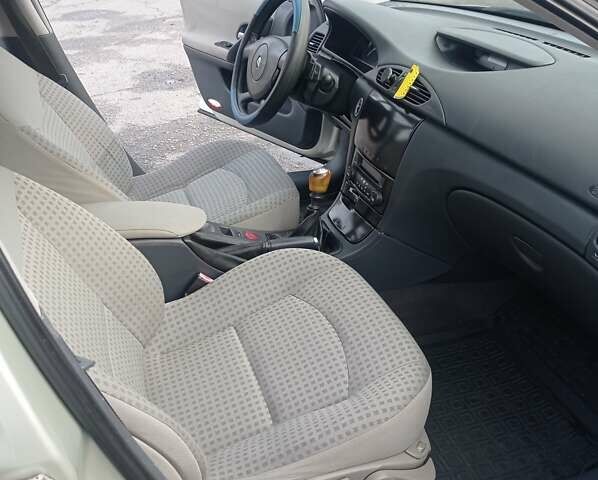Жовтий Рено Лагуна, об'ємом двигуна 1.87 л та пробігом 303 тис. км за 4200 $, фото 1 на Automoto.ua