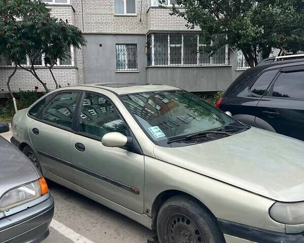 Желтый Рено Лагуна, объемом двигателя 1.9 л и пробегом 236 тыс. км за 550 $, фото 2 на Automoto.ua