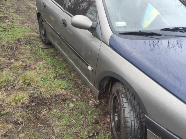 Серый Рено Лагуна, объемом двигателя 2 л и пробегом 212 тыс. км за 1600 $, фото 4 на Automoto.ua