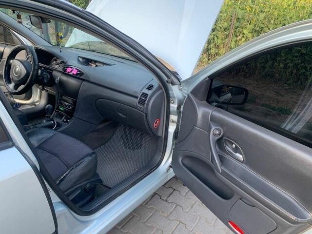 Серый Рено Лагуна, объемом двигателя 1.9 л и пробегом 338 тыс. км за 3300 $, фото 6 на Automoto.ua