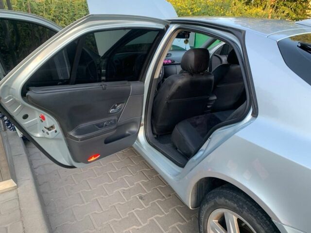 Серый Рено Лагуна, объемом двигателя 1.9 л и пробегом 338 тыс. км за 3300 $, фото 5 на Automoto.ua