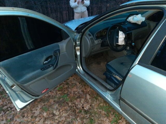 Серый Рено Лагуна, объемом двигателя 0 л и пробегом 324 тыс. км за 1200 $, фото 13 на Automoto.ua