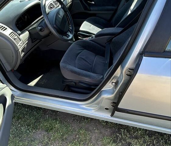 Серый Рено Лагуна, объемом двигателя 1.8 л и пробегом 185 тыс. км за 3500 $, фото 4 на Automoto.ua