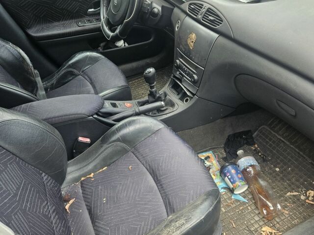 Сірий Рено Лагуна, об'ємом двигуна 1 л та пробігом 300 тис. км за 1207 $, фото 2 на Automoto.ua