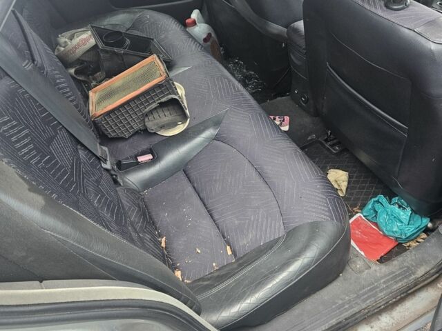 Сірий Рено Лагуна, об'ємом двигуна 1 л та пробігом 300 тис. км за 1207 $, фото 3 на Automoto.ua