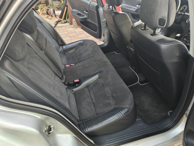 Серый Рено Лагуна, объемом двигателя 2 л и пробегом 145 тыс. км за 5300 $, фото 2 на Automoto.ua