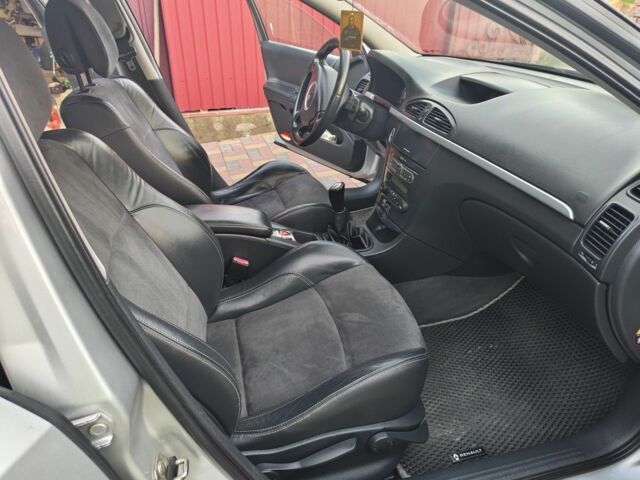 Серый Рено Лагуна, объемом двигателя 2 л и пробегом 145 тыс. км за 5300 $, фото 1 на Automoto.ua