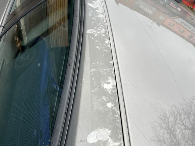 Серый Рено Лагуна, объемом двигателя 1.5 л и пробегом 370 тыс. км за 6000 $, фото 4 на Automoto.ua