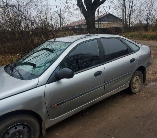 Серый Рено Лагуна, объемом двигателя 1 л и пробегом 777 тыс. км за 929 $, фото 1 на Automoto.ua