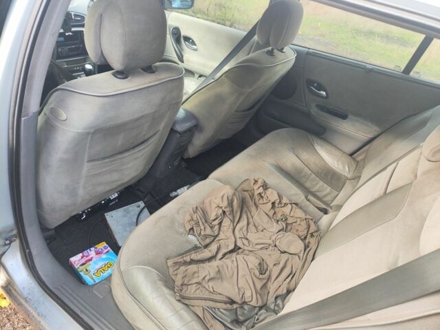 Серый Рено Лагуна, объемом двигателя 1.9 л и пробегом 390 тыс. км за 2600 $, фото 6 на Automoto.ua