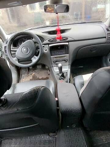 Серый Рено Лагуна, объемом двигателя 2 л и пробегом 294 тыс. км за 3600 $, фото 1 на Automoto.ua