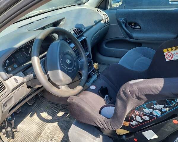 Серый Рено Лагуна, объемом двигателя 1.9 л и пробегом 35 тыс. км за 2800 $, фото 2 на Automoto.ua