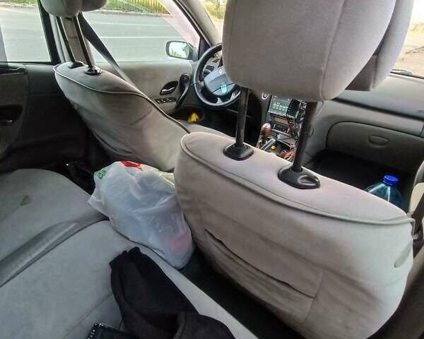 Серый Рено Лагуна, объемом двигателя 1.9 л и пробегом 350 тыс. км за 2900 $, фото 1 на Automoto.ua