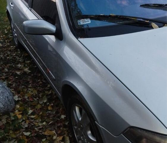 Серый Рено Лагуна, объемом двигателя 1.9 л и пробегом 340 тыс. км за 1750 $, фото 1 на Automoto.ua