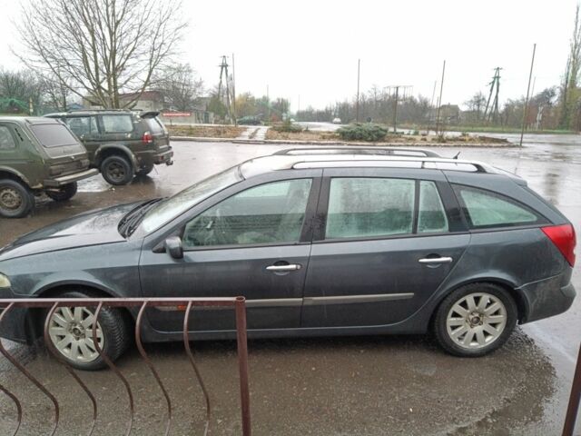 Серый Рено Лагуна, объемом двигателя 1.9 л и пробегом 330 тыс. км за 1900 $, фото 4 на Automoto.ua