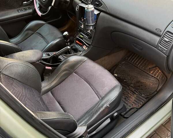 Рено Лагуна 2001 в Тернополе на Automoto.ua Серый Рено Лагуна, объемом двигателя 1.9 л и пробегом 293 тыс. км за 3333 $, фото 9 на Automoto.ua