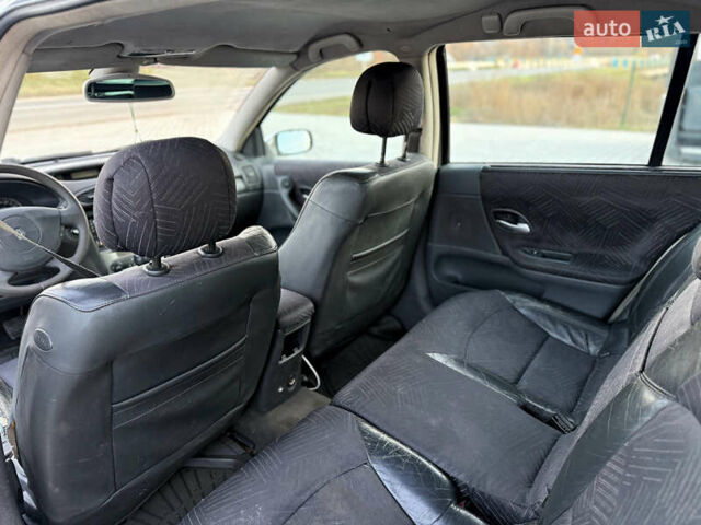 Серый Рено Лагуна, объемом двигателя 1.9 л и пробегом 300 тыс. км за 2200 $, фото 20 на Automoto.ua