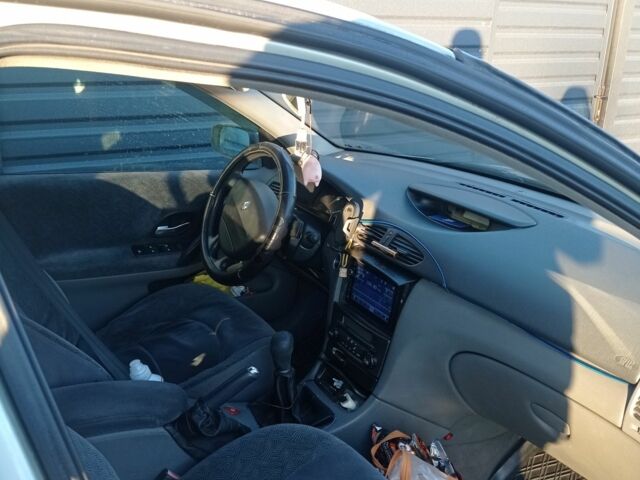 Серый Рено Лагуна, объемом двигателя 1.8 л и пробегом 353 тыс. км за 3500 $, фото 2 на Automoto.ua