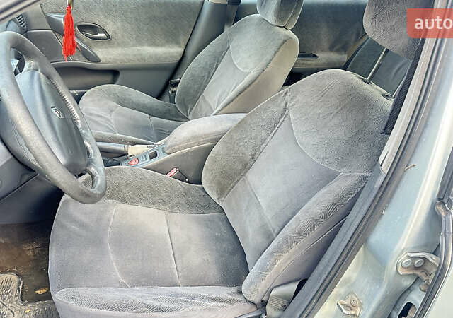 Серый Рено Лагуна, объемом двигателя 1.87 л и пробегом 200 тыс. км за 1500 $, фото 13 на Automoto.ua