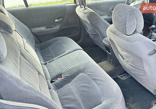 Серый Рено Лагуна, объемом двигателя 1.87 л и пробегом 200 тыс. км за 1500 $, фото 9 на Automoto.ua