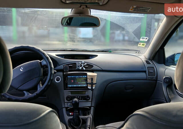 Серый Рено Лагуна, объемом двигателя 1.87 л и пробегом 350 тыс. км за 2750 $, фото 4 на Automoto.ua