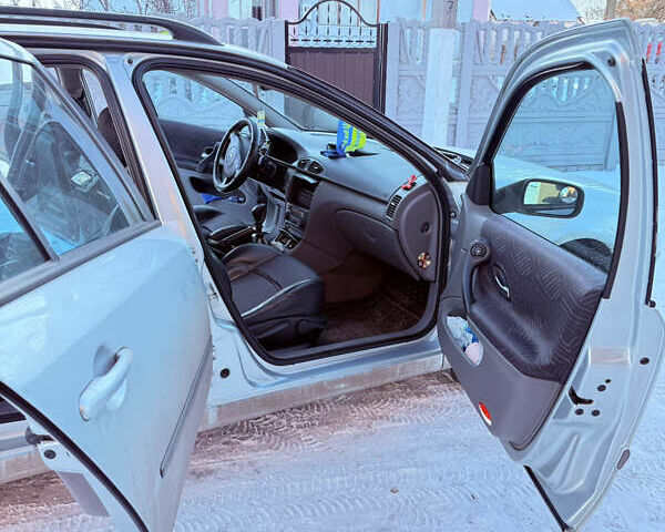 Серый Рено Лагуна, объемом двигателя 2.19 л и пробегом 350 тыс. км за 4199 $, фото 5 на Automoto.ua