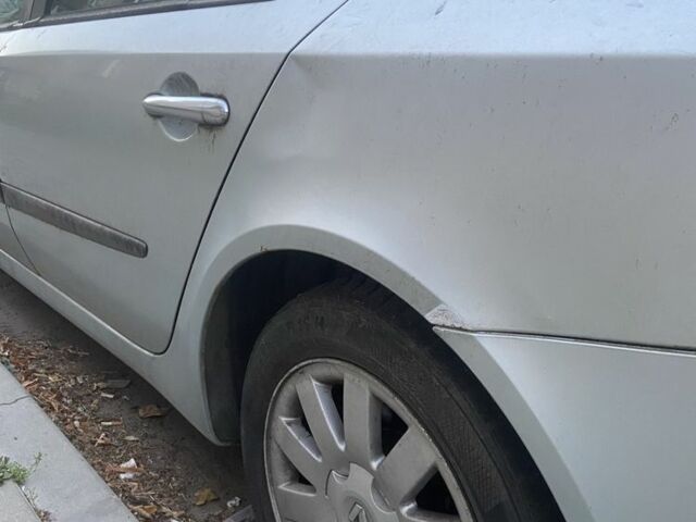 Серый Рено Лагуна, объемом двигателя 2 л и пробегом 300 тыс. км за 1900 $, фото 3 на Automoto.ua