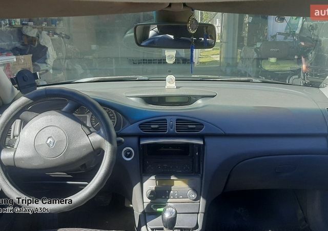 Сірий Рено Лагуна, об'ємом двигуна 1.87 л та пробігом 322 тис. км за 3200 $, фото 6 на Automoto.ua