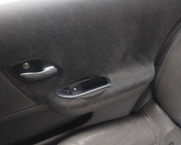 Рено Лагуна 2003 в Коростышеве на Automoto.ua Серый Рено Лагуна, объемом двигателя 1.78 л и пробегом 507 тыс. км за 2600 $, фото 7 на Automoto.ua