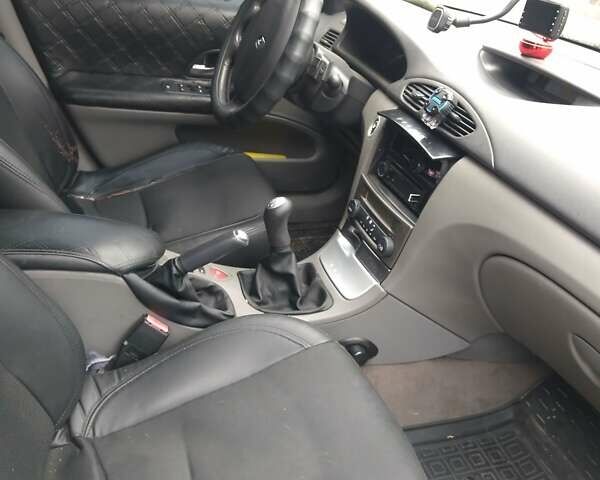 Серый Рено Лагуна, объемом двигателя 2 л и пробегом 281 тыс. км за 3900 $, фото 5 на Automoto.ua