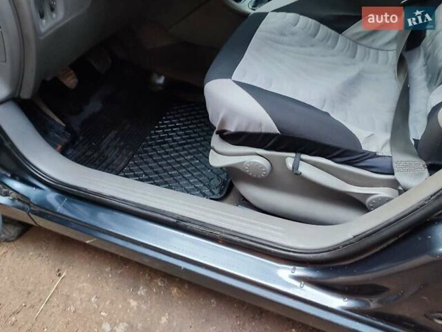 Серый Рено Лагуна, объемом двигателя 1.87 л и пробегом 267 тыс. км за 3200 $, фото 9 на Automoto.ua