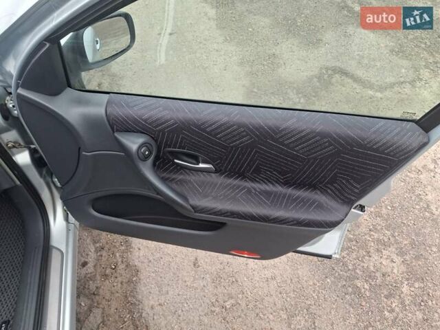 Серый Рено Лагуна, объемом двигателя 2 л и пробегом 186 тыс. км за 4200 $, фото 5 на Automoto.ua