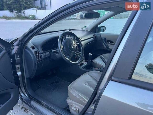 Серый Рено Лагуна, объемом двигателя 2 л и пробегом 230 тыс. км за 4600 $, фото 3 на Automoto.ua