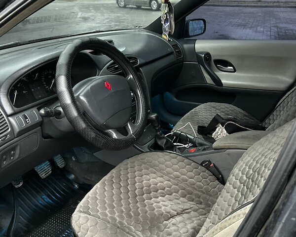 Сірий Рено Лагуна, об'ємом двигуна 1.87 л та пробігом 410 тис. км за 2650 $, фото 4 на Automoto.ua