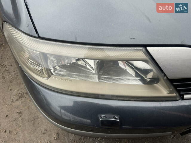Серый Рено Лагуна, объемом двигателя 2.19 л и пробегом 250 тыс. км за 3499 $, фото 3 на Automoto.ua
