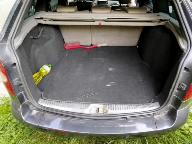 Серый Рено Лагуна, объемом двигателя 2 л и пробегом 350 тыс. км за 3399 $, фото 4 на Automoto.ua