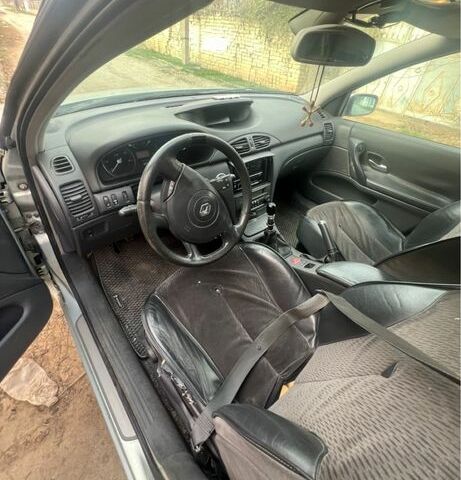 Серый Рено Лагуна, объемом двигателя 1.9 л и пробегом 200 тыс. км за 1500 $, фото 6 на Automoto.ua