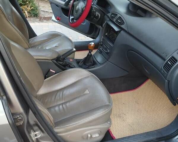 Сірий Рено Лагуна, об'ємом двигуна 2.19 л та пробігом 250 тис. км за 4800 $, фото 4 на Automoto.ua