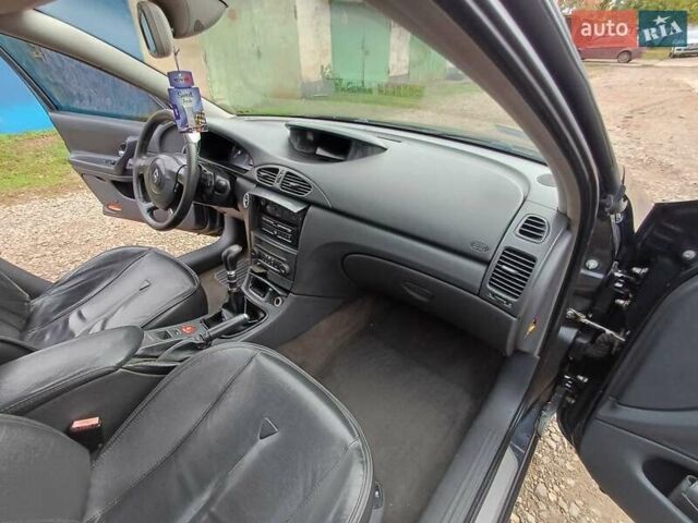 Рено Лагуна 2005 в Кривом Роге на Automoto.ua Серый Рено Лагуна, объемом двигателя 1.9 л и пробегом 343 тыс. км за 3500 $, фото 20 на Automoto.ua