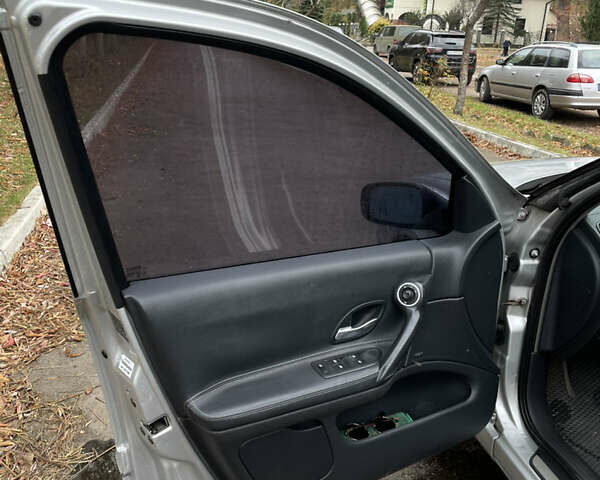 Серый Рено Лагуна, объемом двигателя 2 л и пробегом 199 тыс. км за 4550 $, фото 9 на Automoto.ua