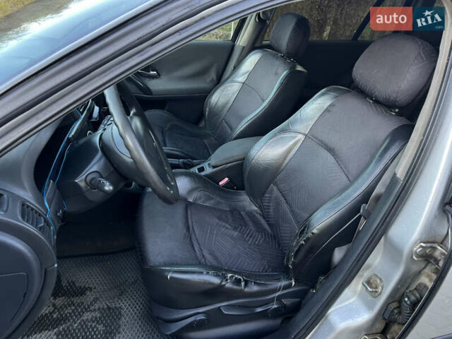 Серый Рено Лагуна, объемом двигателя 1.9 л и пробегом 300 тыс. км за 3200 $, фото 13 на Automoto.ua