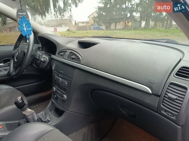 Серый Рено Лагуна, объемом двигателя 2 л и пробегом 232 тыс. км за 5350 $, фото 1 на Automoto.ua