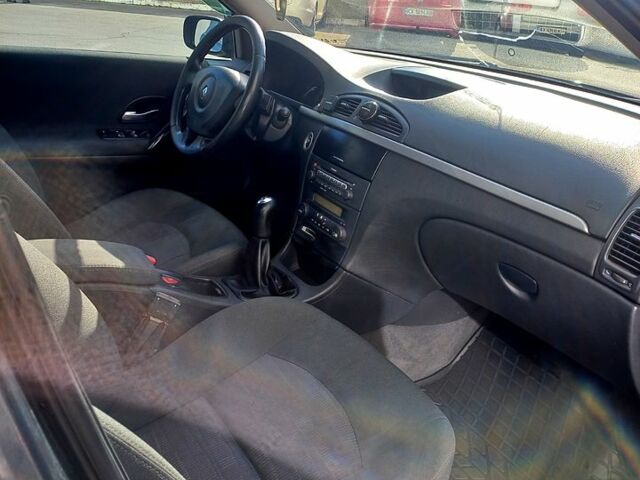 Серый Рено Лагуна, объемом двигателя 2 л и пробегом 206 тыс. км за 5800 $, фото 8 на Automoto.ua