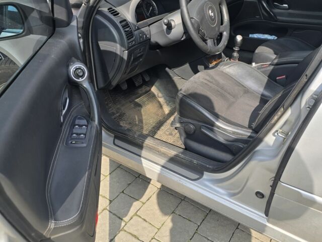 Серый Рено Лагуна, объемом двигателя 1.9 л и пробегом 302 тыс. км за 4000 $, фото 12 на Automoto.ua