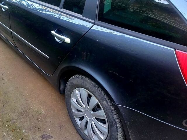 Серый Рено Лагуна, объемом двигателя 1.9 л и пробегом 237 тыс. км за 5400 $, фото 4 на Automoto.ua