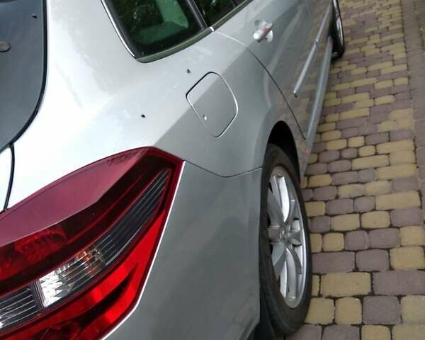 Серый Рено Лагуна, объемом двигателя 1.5 л и пробегом 178 тыс. км за 5500 $, фото 3 на Automoto.ua