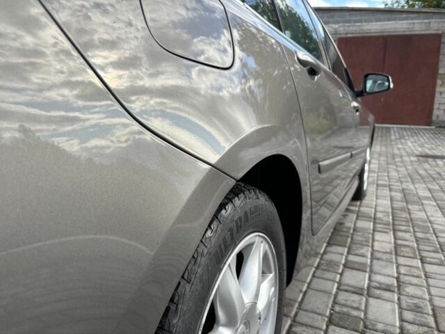 Сірий Рено Лагуна, об'ємом двигуна 1.5 л та пробігом 269 тис. км за 6000 $, фото 3 на Automoto.ua