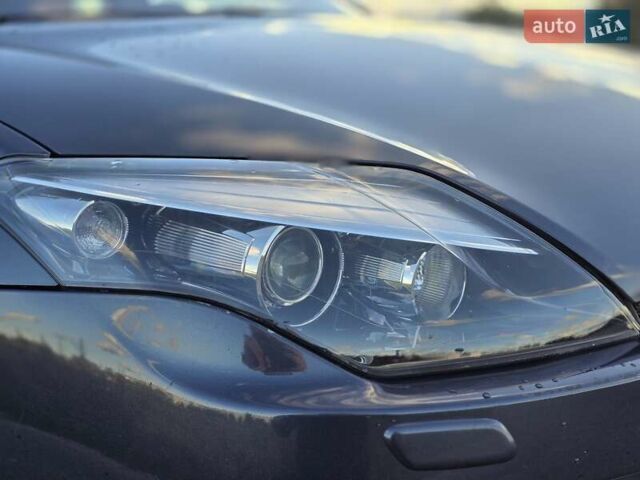 Сірий Рено Лагуна, об'ємом двигуна 2 л та пробігом 283 тис. км за 9376 $, фото 35 на Automoto.ua