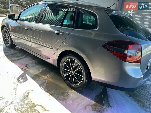 Серый Рено Лагуна, объемом двигателя 1.5 л и пробегом 210 тыс. км за 7500 $, фото 5 на Automoto.ua