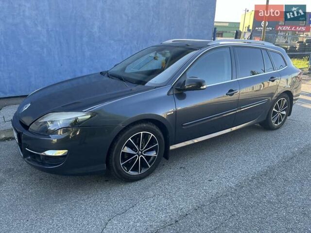 Серый Рено Лагуна, объемом двигателя 2 л и пробегом 255 тыс. км за 6500 $, фото 4 на Automoto.ua